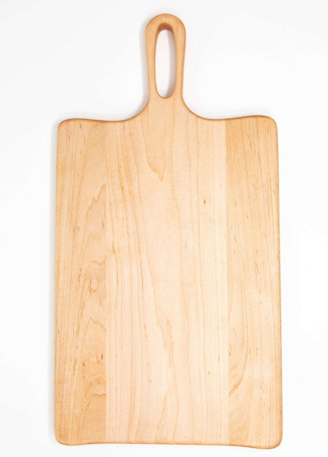 Medium size wood charcuterie board, made of light blonde Maple, with unique looped handle and exaggerated curves.