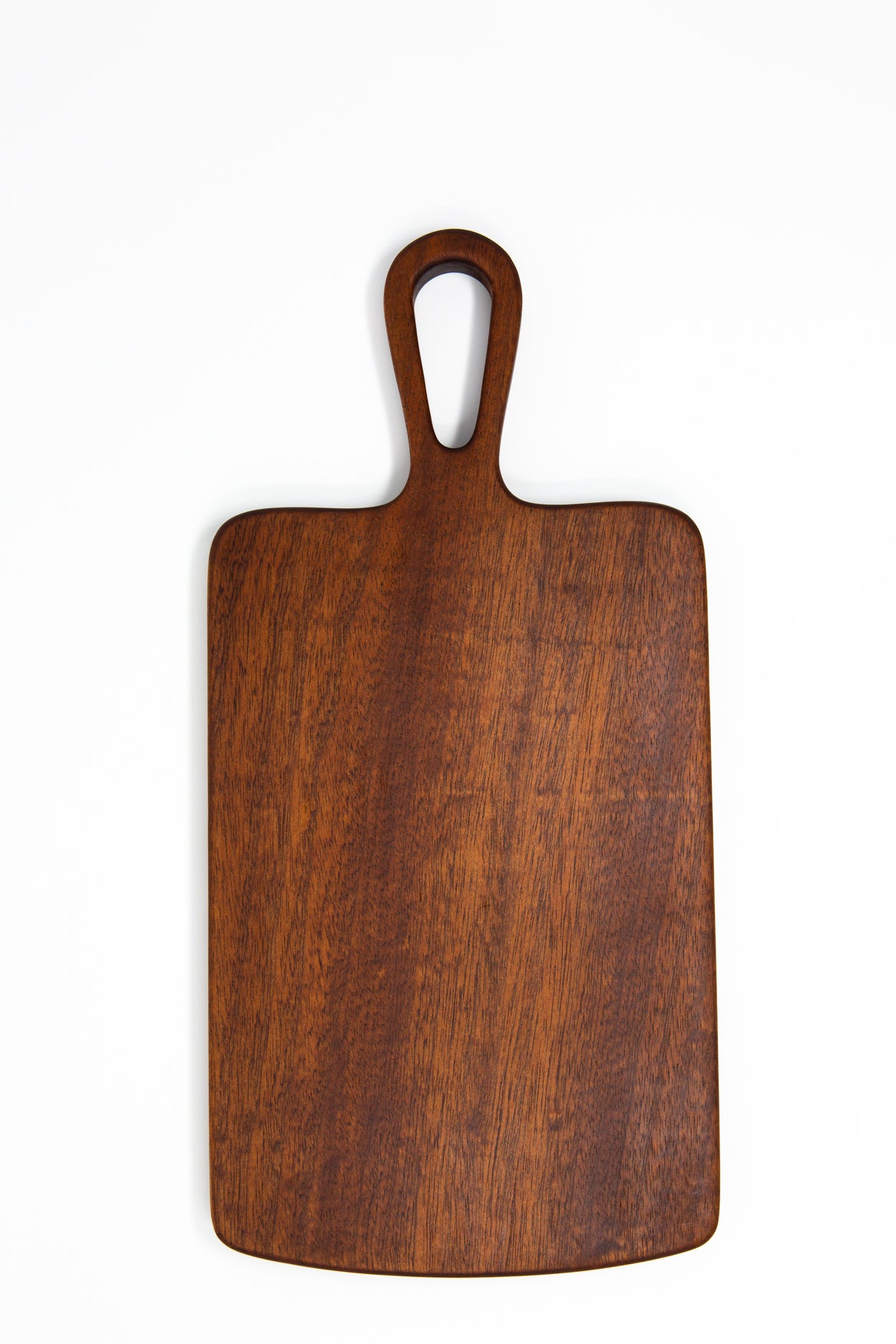 Extra small wood charcuterie board, made of a dark reddish-brown Sapele, with smooth curves and a unique teardrop handle.